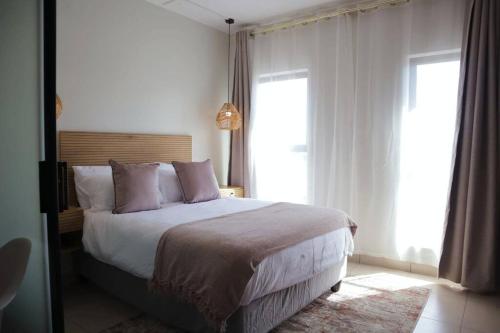 Ένα ή περισσότερα κρεβάτια σε δωμάτιο στο Urban stay on Hilton