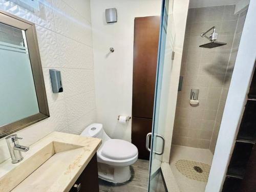 Koupelna v ubytování Departamento frente al mar en zona cerritos