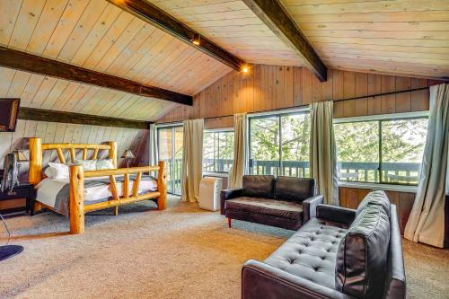 a living room with a couch and a bed at 3 Mi to Ski Slopes Park City Retreat with Game Room in Park City