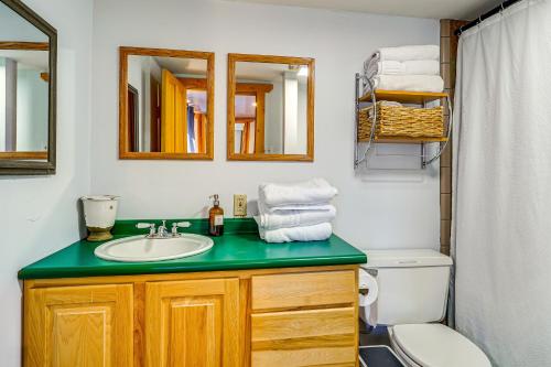 a bathroom with a sink and a toilet at 3 Mi to Ski Slopes Park City Retreat with Game Room in Park City
