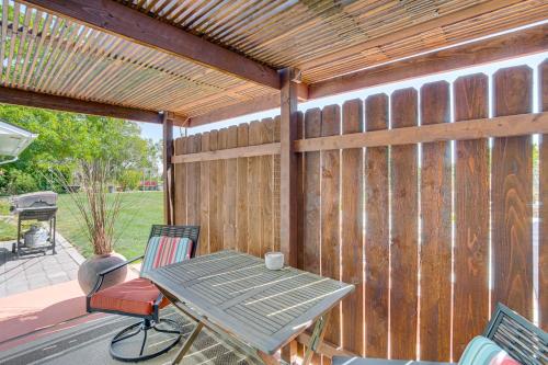 a patio with a table and chairs and a fence at Yakima Wine Country Retreat with Scenic Valley Views in Yakima