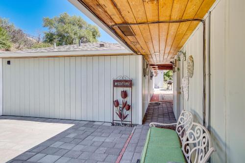 a porch with a bench and a sign on it at Yakima Wine Country Retreat with Scenic Valley Views in Yakima