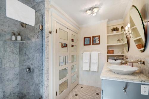 a bathroom with a sink and a shower at Sonoma Victorian In Heart Of Sonoma in Sonoma