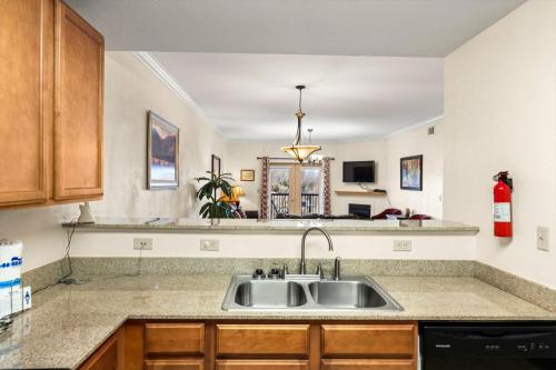 a kitchen with a sink and a counter top at Vacation Destination in Pigeon Forge