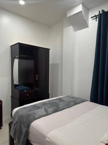 Ένα ή περισσότερα κρεβάτια σε δωμάτιο στο Apex apartment 4