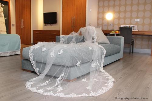 Ένα ή περισσότερα κρεβάτια σε δωμάτιο στο Hotel Ciudad de Ponferrada, Ascend Hotel Collection