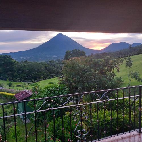 a view of a mountain from a balcony at Villa Esperanza El Castillo in Fortuna