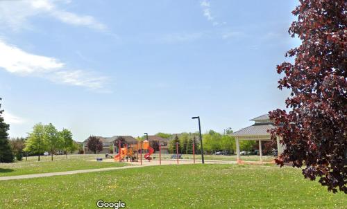 a park with a playground with a playground at Garden 2 BR Apt - Free Parking Wifi Laundry Workstation in Brampton