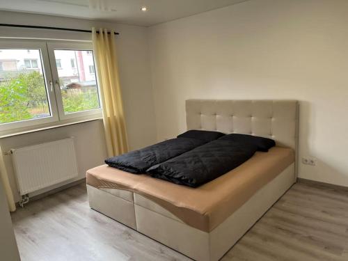 Giường trong phòng chung tại 4 Zimmer Wohnung - 120qm