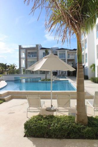 Piscina en o cerca de Sunset Luxury Punta Cana