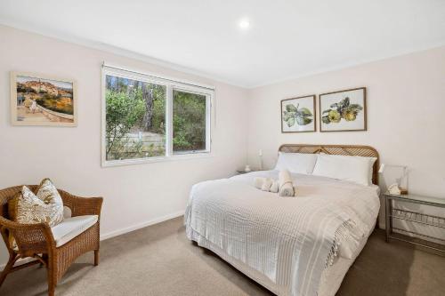 Ένα ή περισσότερα κρεβάτια σε δωμάτιο στο Yarringa Beach House