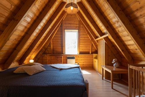 Postel nebo postele na pokoji v ubytování Ferienhaus Opi Huck Stroot 41