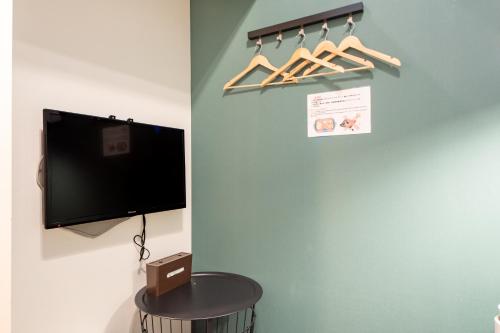 Μια τηλεόραση ή/και κέντρο ψυχαγωγίας στο Apartment Sanjo