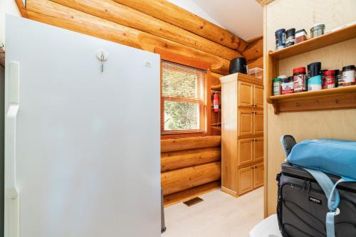 Ένα ή περισσότερα κρεβάτια σε δωμάτιο στο Highland Loch Lodge