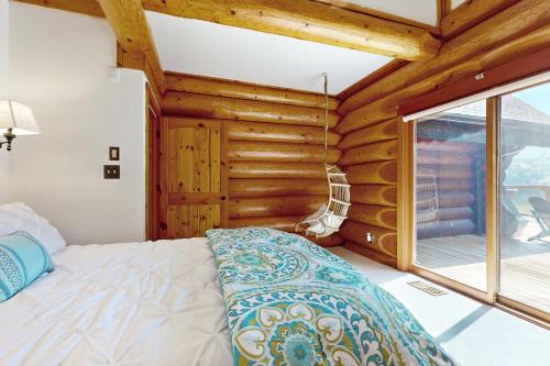 Ένα ή περισσότερα κρεβάτια σε δωμάτιο στο Highland Loch Lodge