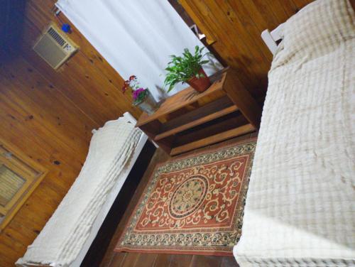 Ένα ή περισσότερα κρεβάτια σε δωμάτιο στο Casa de campo el lapacho