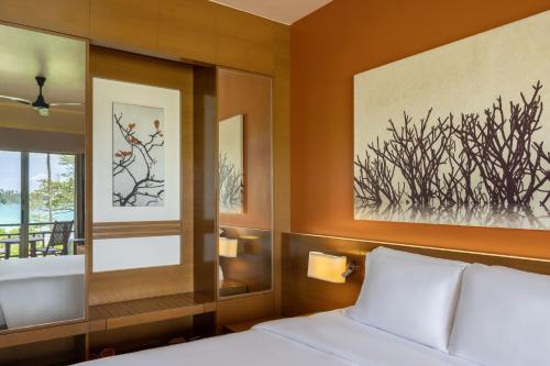 Cama o camas de una habitación en Angsana Bintan