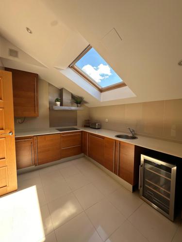 Η κουζίνα ή μικρή κουζίνα στο Bustos Home Apartamento