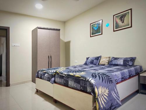 Cama o camas de una habitación en Symphony Apartments at MIHAN Nagpur