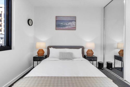 Ein Bett oder Betten in einem Zimmer der Unterkunft Portside Paradise - Steps away from the Port