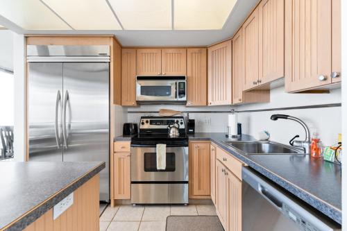 Dapur atau dapur kecil di Sand and Sea Condos