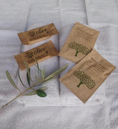 two packets of sun glue with a plant on it at Il Poderino di Civitavecchia in Civitavecchia