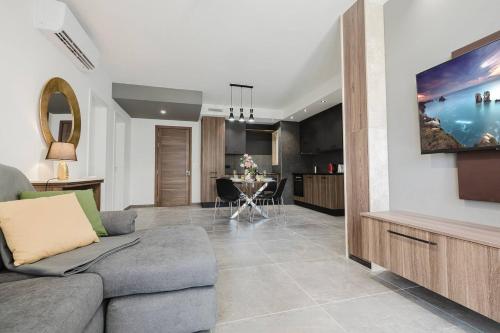 Гостиная зона в Brandnew 2bed Family Apartment Mellieha By Homely!
