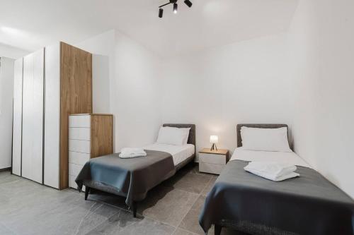 Кровать или кровати в номере Brandnew 2bed Family Apartment Mellieha By Homely!