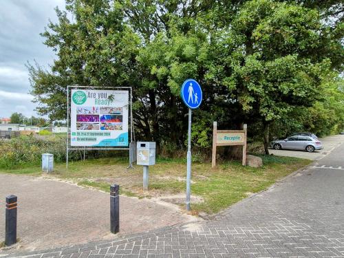 a street sign on the side of a road at Chalet V31 in Makkum