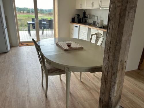 a table with a tray on top of it in a kitchen at Magasinet Stora Långbro in Tystberga