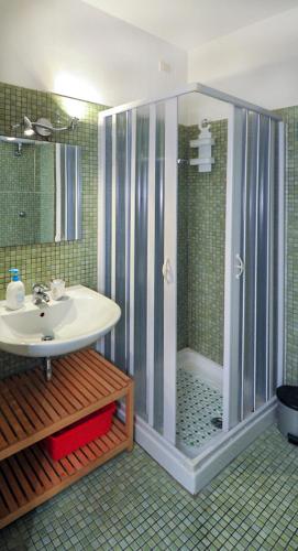 a bathroom with a shower and a sink at Vado al teatro monolocale in centro per 2 in Ancona
