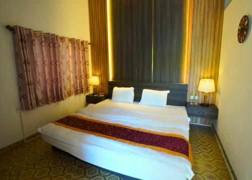 Letto o letti in una camera di Ha Giang Loop Hostel & Tours