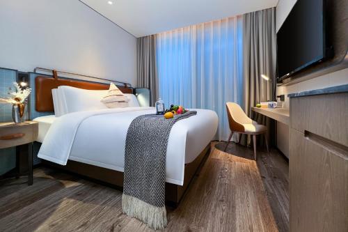 Gallery image of Echarm Hotel Dongguan International Automobile City Basketball Center in Dongguan