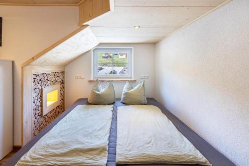 Postel nebo postele na pokoji v ubytování Mühlen Chalet
