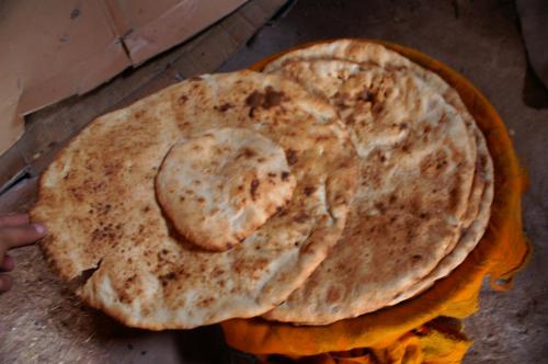 two tortilla pies sitting on top of a table at Maison d'hôtes Dar El Nath in Ouarzazate