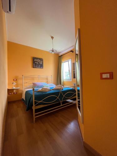 a hospital room with a bed and a window at Corte Bussari in Arquà Polesine