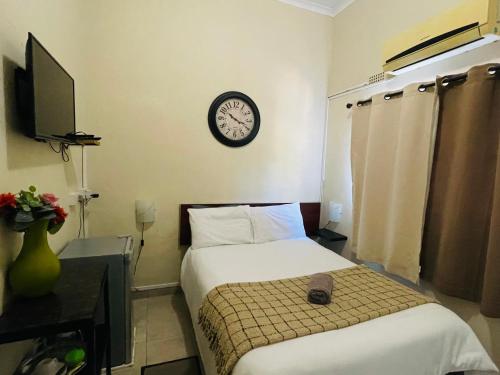 Ένα ή περισσότερα κρεβάτια σε δωμάτιο στο Abrama Bed And Breakfast