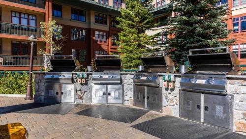 a row of stainless steel appliances in front of a building at Marriott Timber Lodge Luxury Studio in Stateline