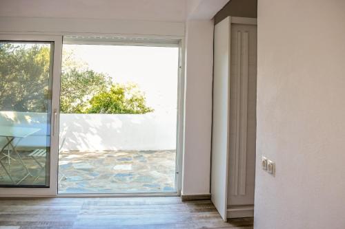 an open door with a view of a patio at View Villas in Punta