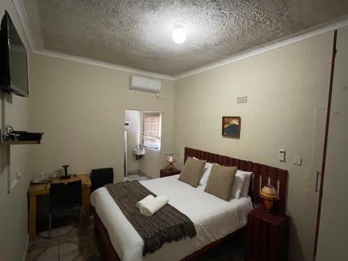 Μια τηλεόραση ή/και κέντρο ψυχαγωγίας στο Abrama Bed And Breakfast