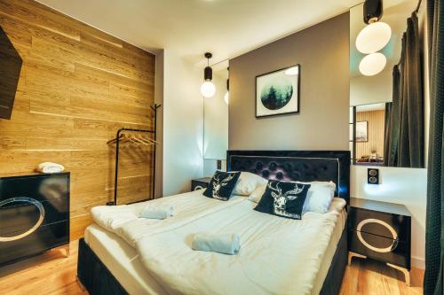 Posteľ alebo postele v izbe v ubytovaní Kwarc G2 - Apartament Rodzinny - Prywatna SAUNA