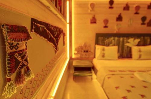Aşk-ı Nare Cave Hotel - Swimming Pool & SPAにあるベッド