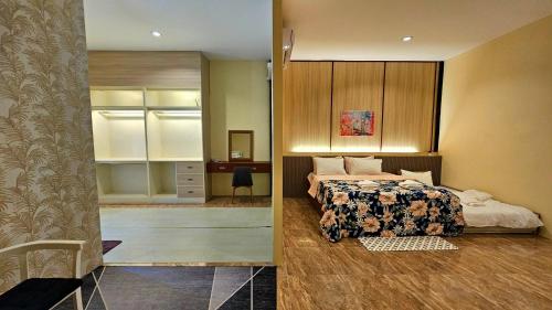 two pictures of a bedroom with a bed and a desk at PhuriPoolvilla ภูริพูลวิลล่า in Hang Dong