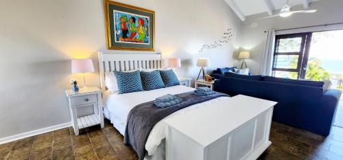 Ένα ή περισσότερα κρεβάτια σε δωμάτιο στο Blue Bay Cottage - sleeps 2