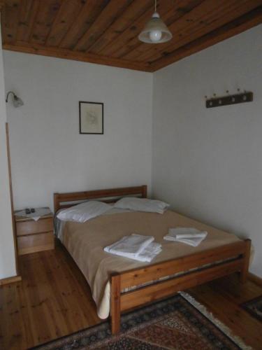Postel nebo postele na pokoji v ubytování Guesthouse Gouris