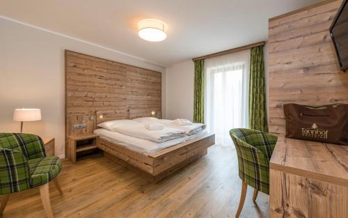 En eller flere senge i et værelse på Bed & Breakfast ABIS - Dolomites