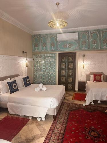Llit o llits en una habitació de Riad Dalla Santa