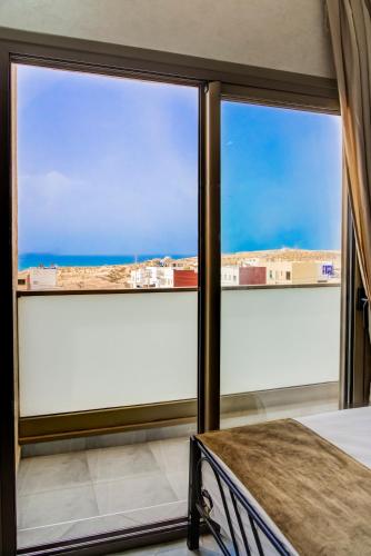 a view from a room with two large windows at jaws wave imsouane in Imsouane
