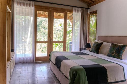Ένα ή περισσότερα κρεβάτια σε δωμάτιο στο Villa Juliette