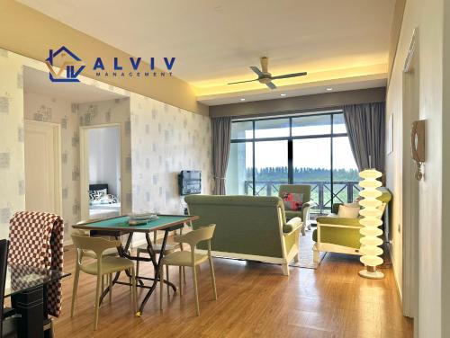 a living room with a dining table and chairs at Costa Mahkota - 1min I Mahkota Parade Mall I Dataran Pahlawan I Mahkota Hospital in Melaka